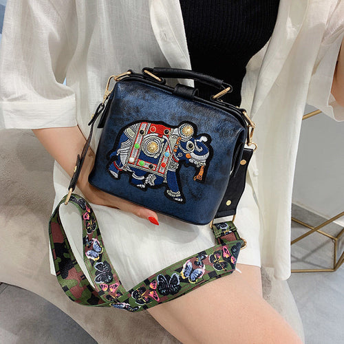 Elephant embroidered shoulder handbag